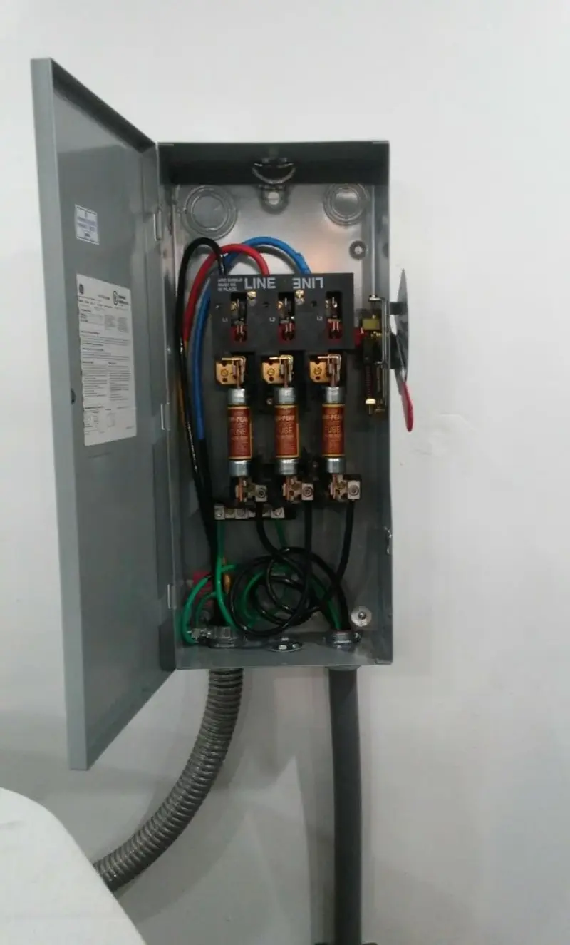 Three-phase disconnect switch installed for Smoke Detector Installation in Elbridge